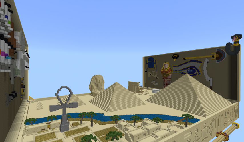 A representation of the Egyptian landscape in a giant toybox in Minecraft: Education Edition, featuring the Sphinx, two pyramids, the Nile River, and a giant ankh.